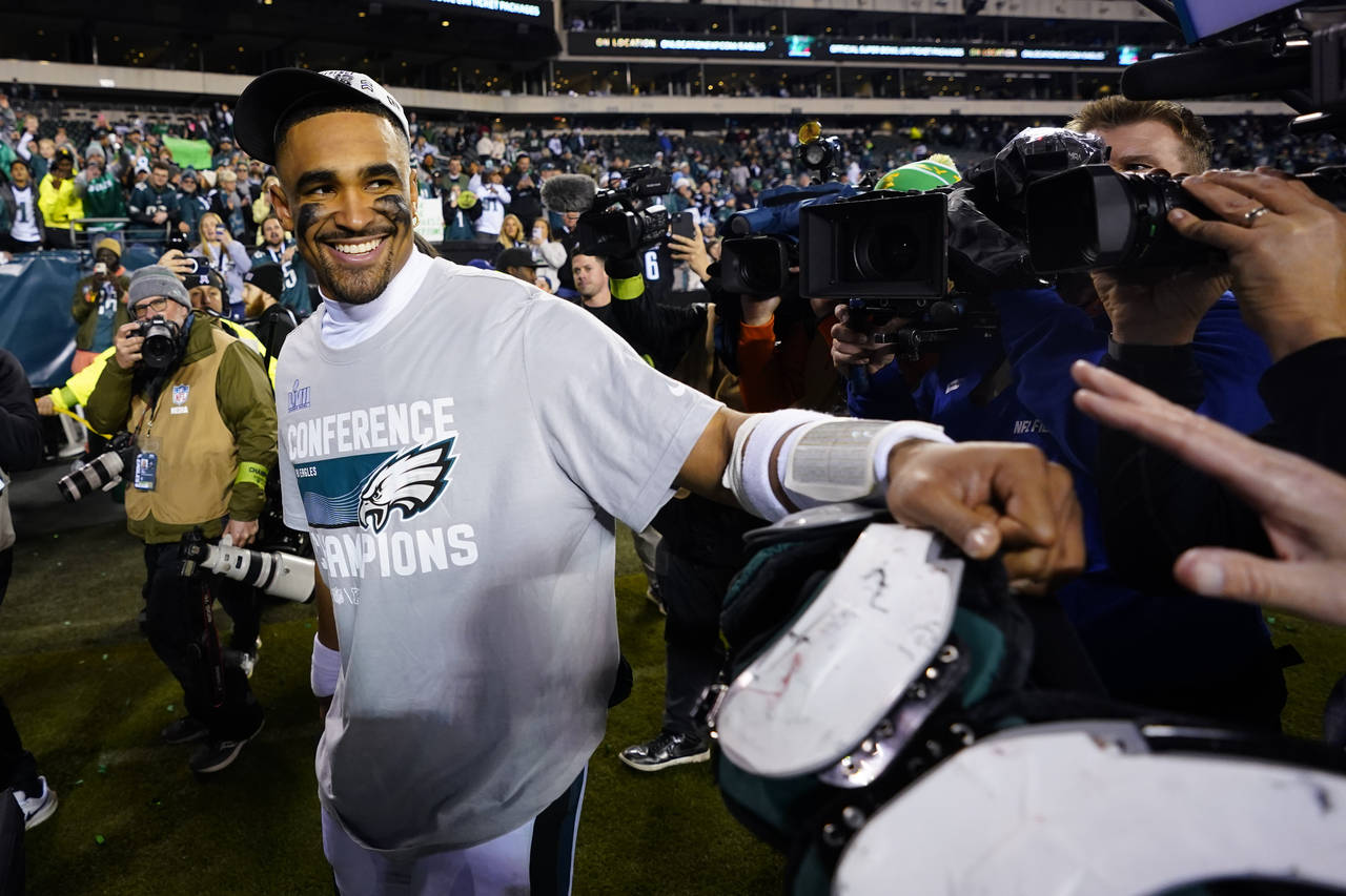 Philadelphia Eagles quarterback Jalen Hurts reacts after the NFC Championship NFL football game bet...