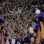 Adams scores late, No. 2 Kansas edges No. 14 Iowa St 62-60
