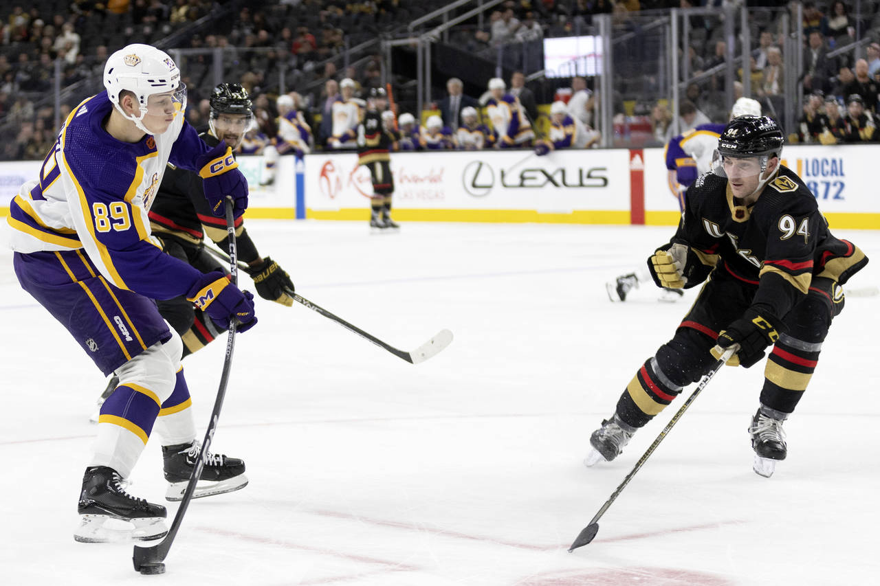 Los Angeles Kings center Rasmus Kupari (89) shoots as Vegas Golden Knights defenseman Brayden Pacha...