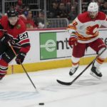 Domi scores in OT to lift Blackhawks over Flames 4-3