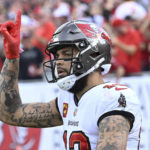 Brady, Bucs rally to beat Panthers 30-24, clinch NFC South