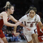 Boston's sets record, No. 1 Gamecocks top Arkansas 92-46