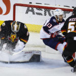 Dube scores in OT, Flames beat Blue Jackets 4-3