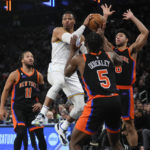 James has triple-double, leads Lakers past Knicks in OT
