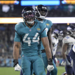 Jags return fumble for TD, beat Titans for AFC South title