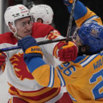 Thomas scores in OT, Blues rally past Flames 4-3