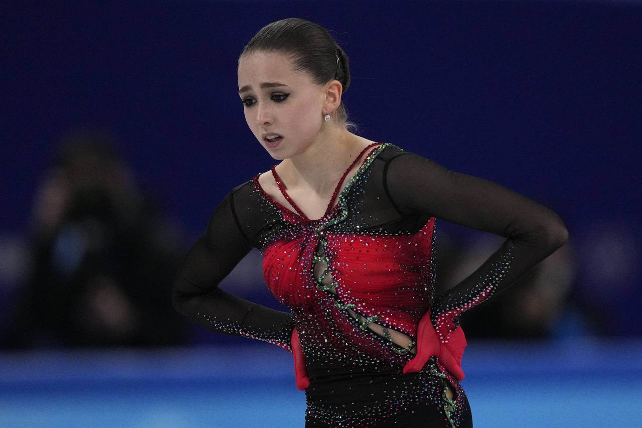 FILE - Kamila Valieva, of the Russian Olympic Committee, reacts after the women's free skate progra...