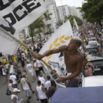 Pelé buried at cemetery in Brazilian city he made famous
