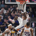 Bridges leads undermanned Suns past Curry, Warriors 125-113