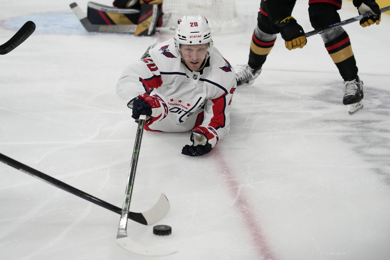 Washington Capitals center Lars Eller (20) vies for the puck against the Vegas Golden Knights durin...
