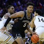 Bynum leads No. 23 Providence past Villanova 70-65