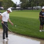 Reed fares better than McIlroy after delayed start in Dubai