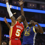 Thompson's season-best 54 leads Warriors past Hawks in 2OT