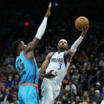 Dinwiddie scores 36, Mavs top Suns 99-95 after Doncic hurt