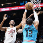 Garland, Mitchell lead Cavs past banged-up Suns 112-98