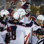 Dube scores in OT, Flames beat Blue Jackets 4-3