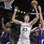Paul, Bridges help Suns escape Spurs in overtime, 121-116