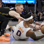Bridges leads undermanned Suns past Curry, Warriors 125-113