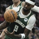 Holiday scores season-high 37, Bucks beat Raptors 130-122