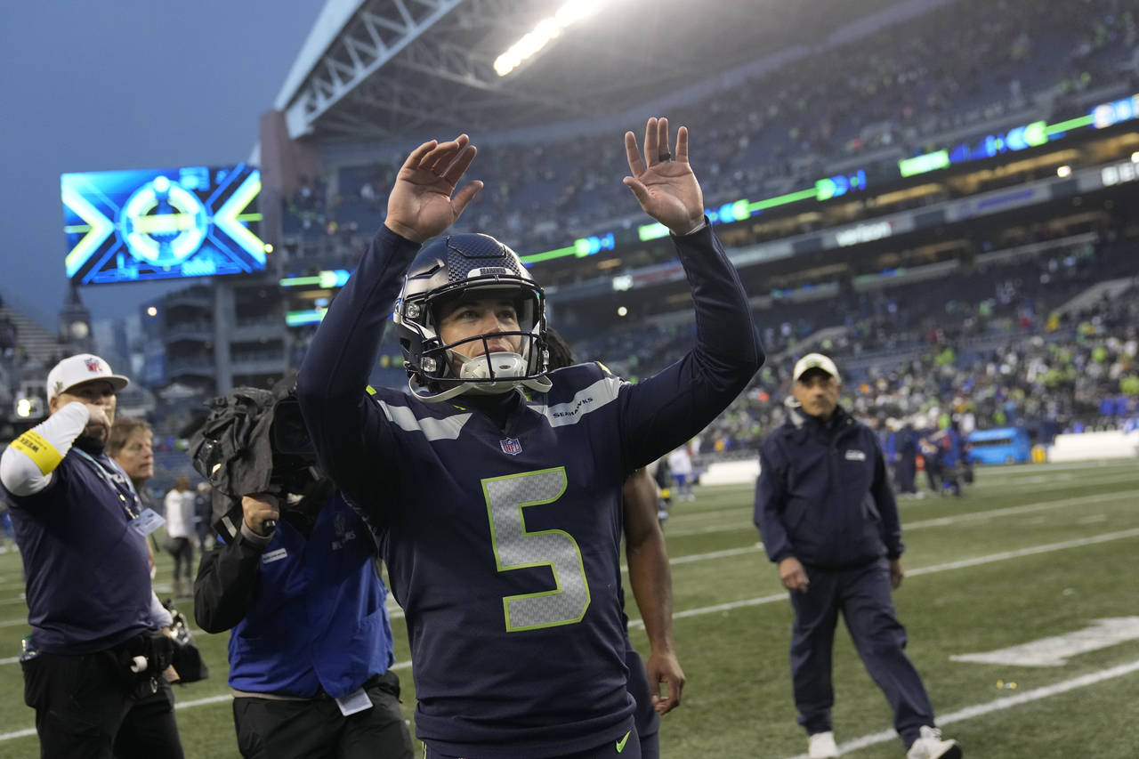 Seattle Seahawks place kicker Jason Myers (5) celebrates after making the game-winning field goal i...