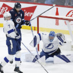 Connor's record 41st winner leads Jets past Lightning 4-2