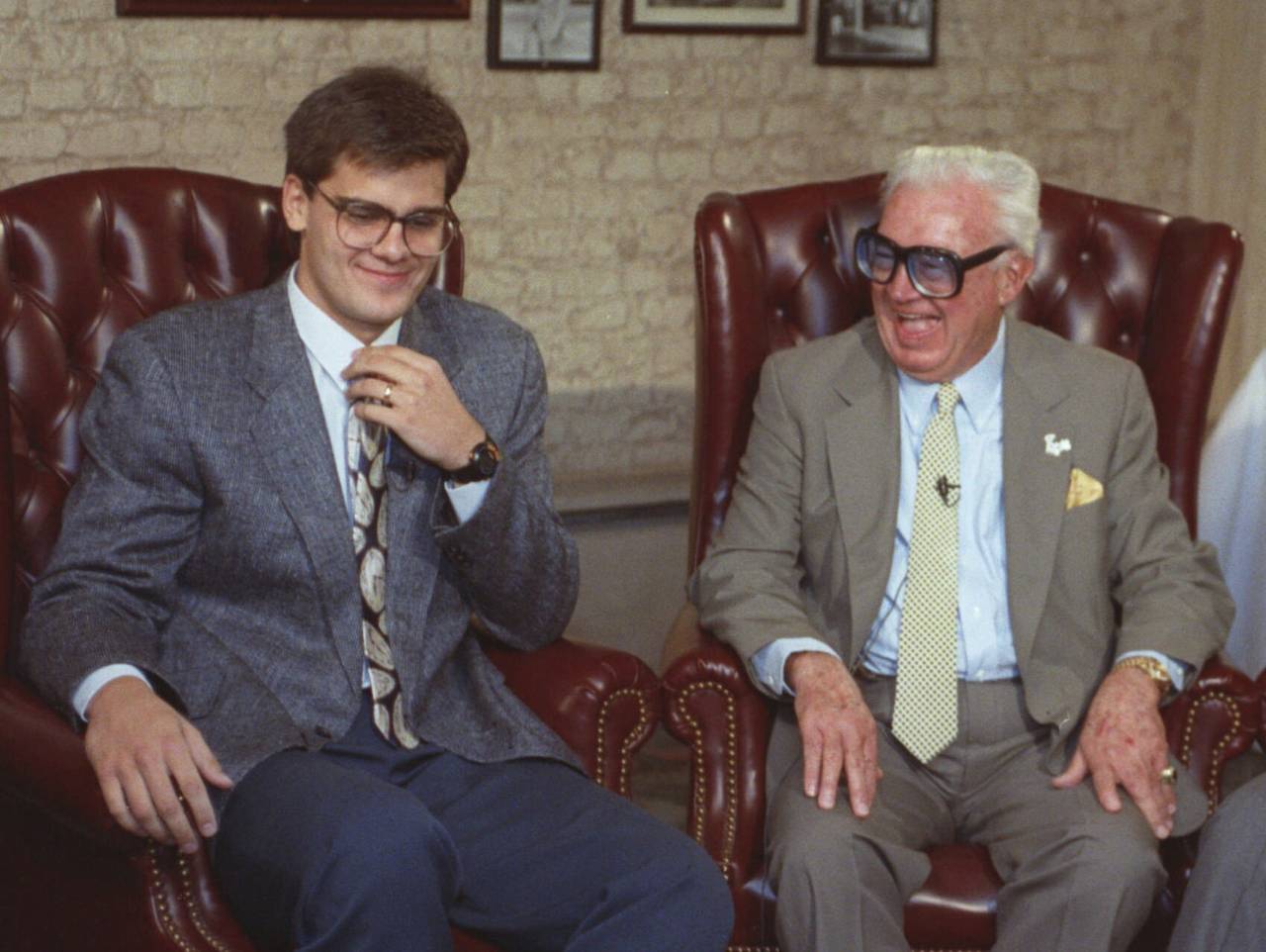 FILE - Hall of Fame baseball announcer Harry Caray, right, laughs with his grandson Chip in Chicago...