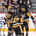 Couture leads Sharks past Penguins 6-4 to end four-game skid