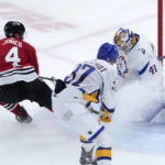 Seth Jones rallies Blackhawks past Sabres 4-3 in overtime