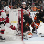 Hughes, Bratt lead Devils' 6-2 rout of Ducks