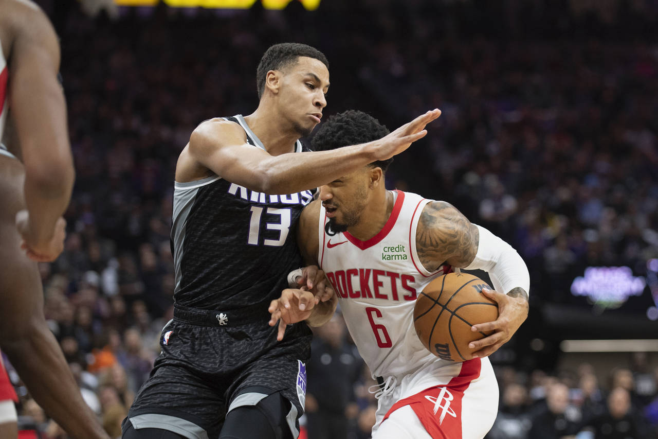 Sacramento Kings forward Keegan Murray (13) defends against Houston Rockets forward Kenyon Martin J...