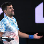 Djokovic bothered by leg, heckler during Australian Open win