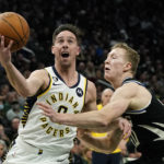 Holiday sparks late rally as Bucks beat Pacers 132-119