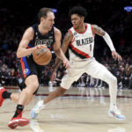 Grant scores 36, Blazers rout Pistons in Payton's debut