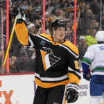 Malkin's 4-point game fuels rally as Pens top Canucks 5-4