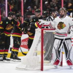 Canucks beat Blackhawks 5-2 in Tocchet's debut as coach