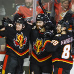 Dube scores in OT, Flames beat Blue Jackets 4-3
