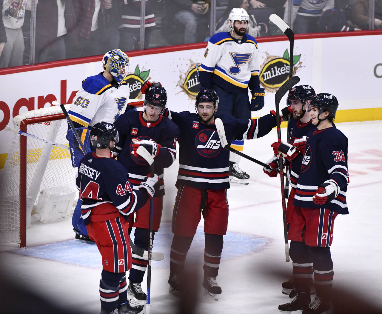 Winnipeg Jets' Josh Morrissey (44) celebrates after his goal against the St. Louis Blues with Saku ...