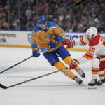Thomas scores in OT, Blues rally past Flames 4-3