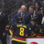 Canucks beat Blackhawks 5-2 in Tocchet's debut as coach