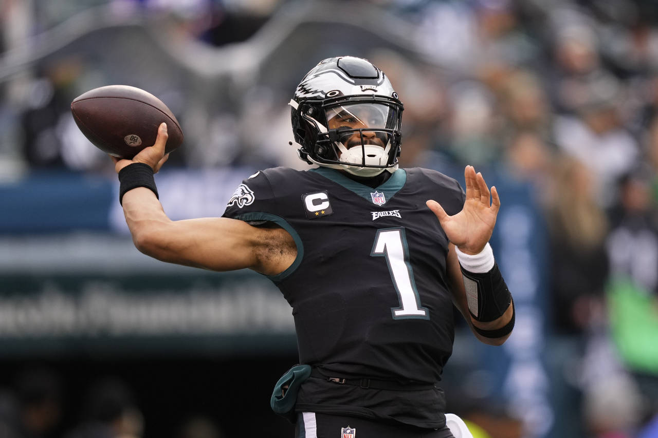 Philadelphia Eagles quarterback Jalen Hurts works out prior to an NFL football game against the New...