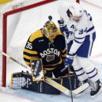 Grzelcyk breaks tie late, Bruins beat Maple Leafs 4-3
