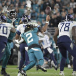 Jags return fumble for TD, beat Titans for AFC South title