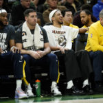 Holiday sparks late rally as Bucks beat Pacers 132-119