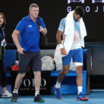 Djokovic bothered by leg, heckler during Australian Open win