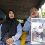 Indonesia opens trial for 5 charged over soccer crush deaths