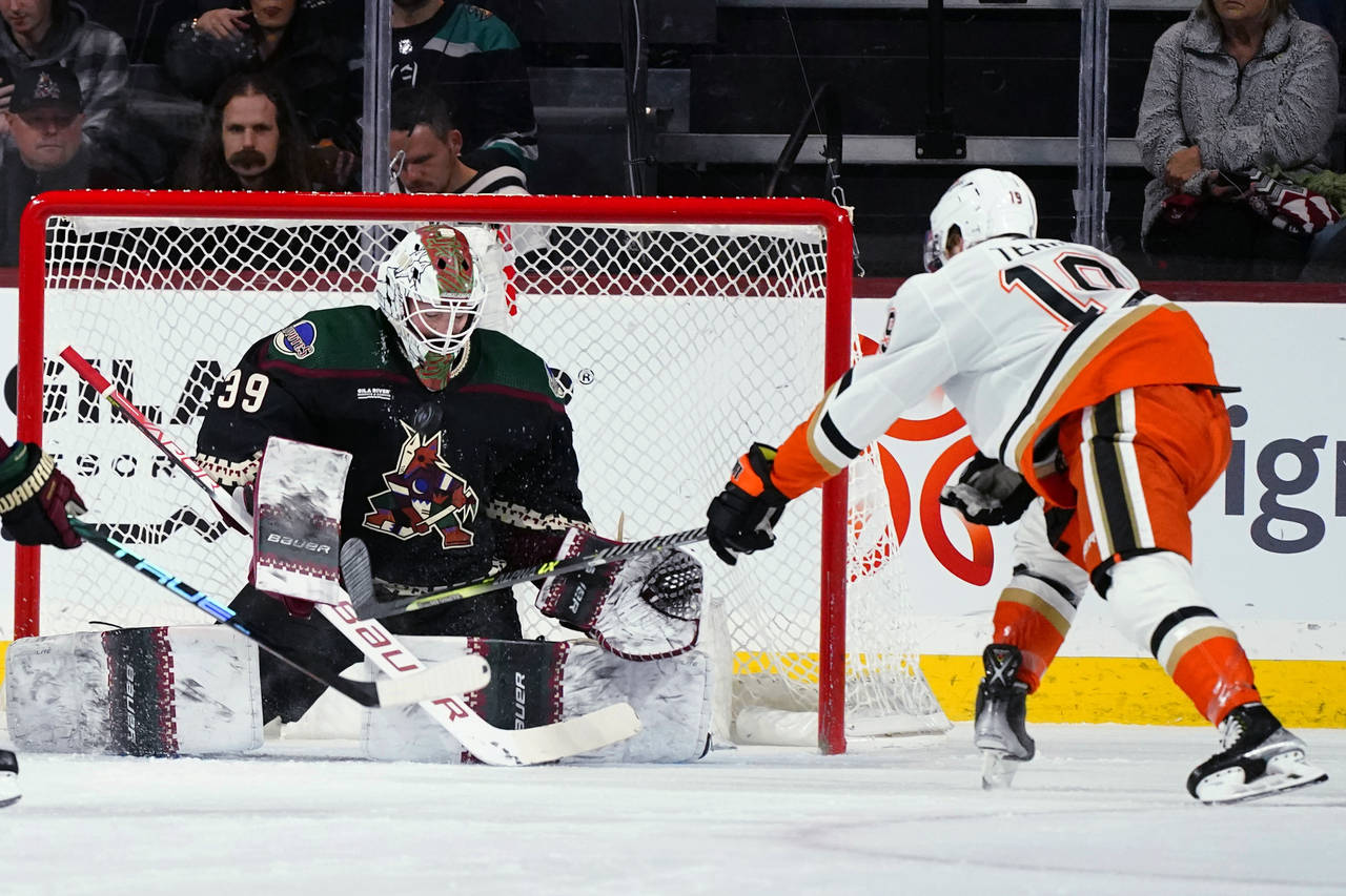 Arizona Coyotes goaltender Connor Ingram (39) makes a save on a shot by Anaheim Ducks right wing Tr...