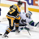 Malkin's 4-point game fuels rally as Pens top Canucks 5-4