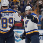 Thomas, Saad spark Blues in 5-2 win over Predators