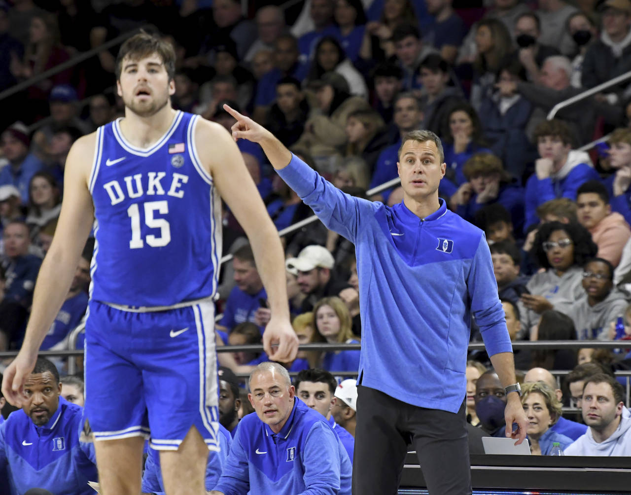 Duke head coach Jon Scheyer directs his team during the second half of an NCAA college basketball g...
