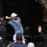 Rahm ties rookie Thompson for AmEx lead at 23 under
